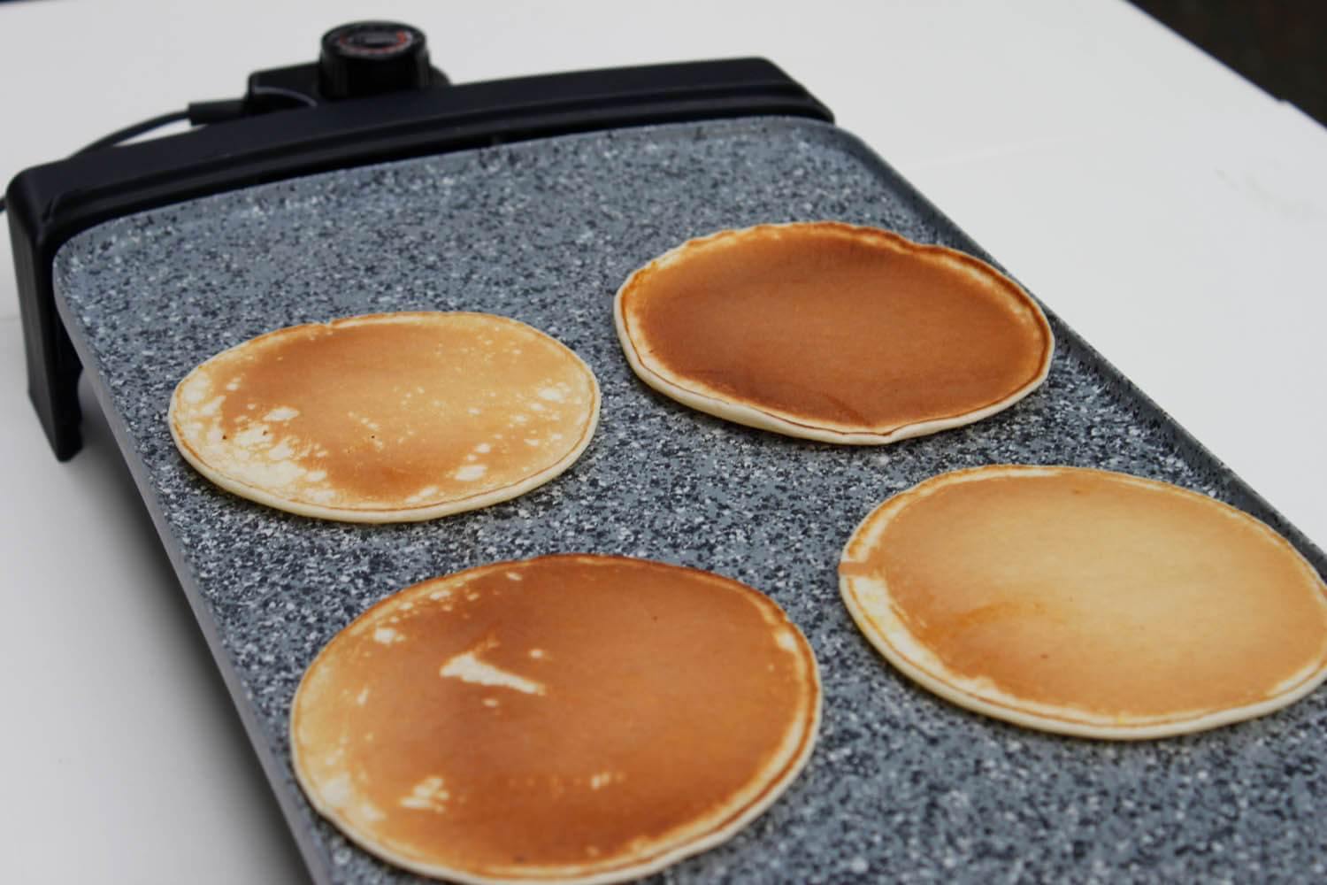 Cooking pancakes on Atgrills electric griddle
