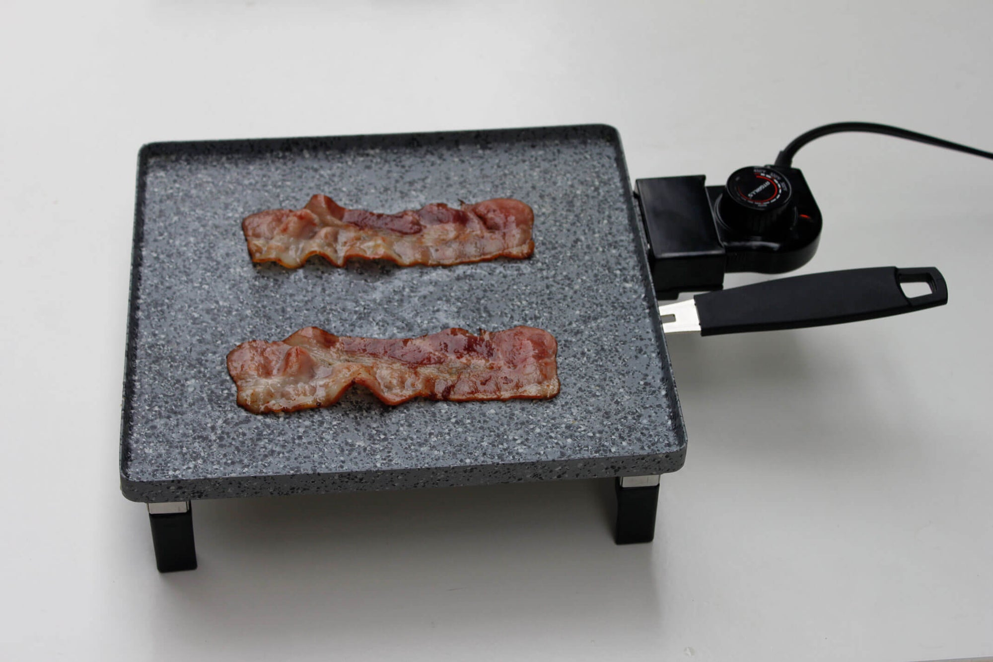 Bacon on indoor electric griddle pan